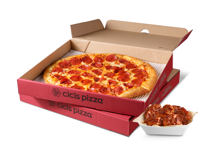 Stacked Cicis pizza boxes with one open showing a pepperoni pizza. Next to the boxes is a basket of boneless wings coated in a glossy sauce.